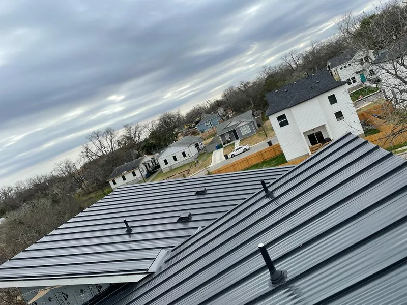 Standing seam metal roof panels with vents for Skylight Repair in Granite City
